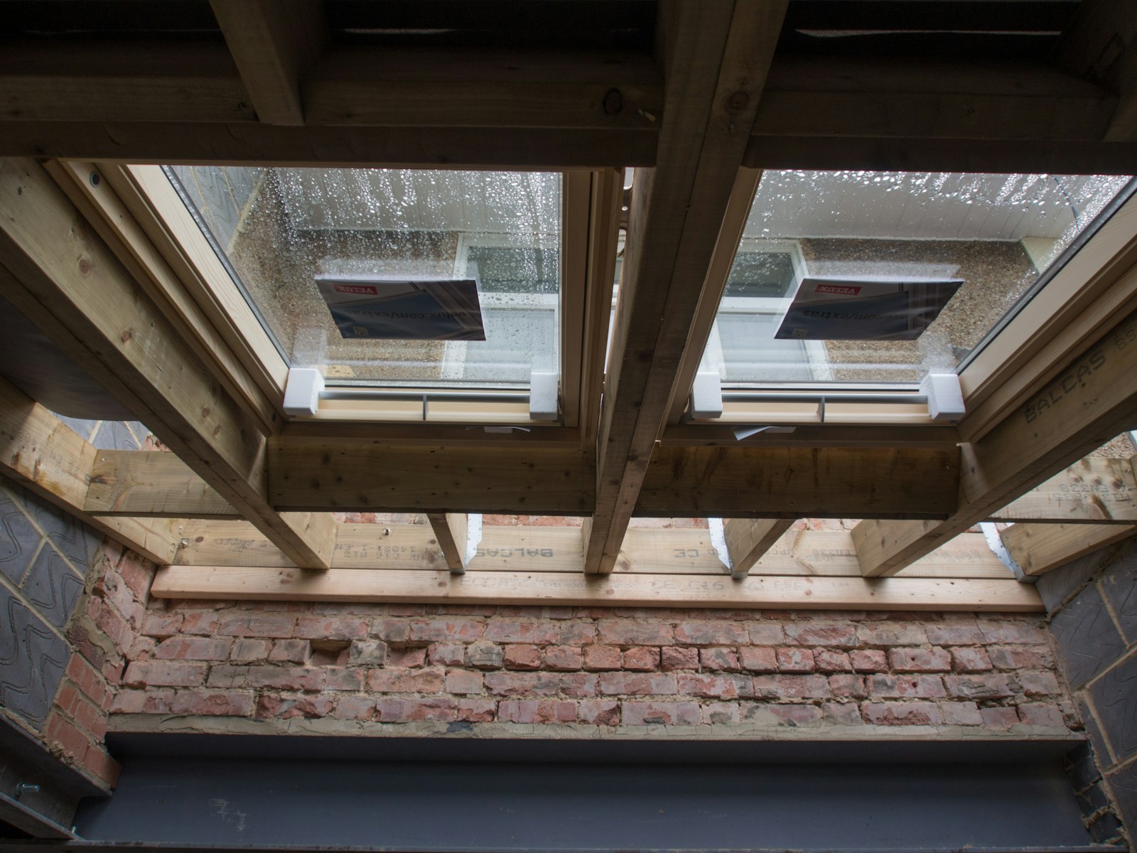 New loft space with roof windows and exposed timber